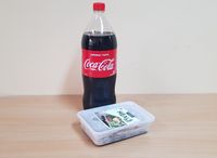 Laing with 1.5L Coke