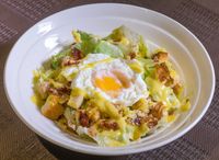 Caesar Salad Topped with Bacon & Poached Egg