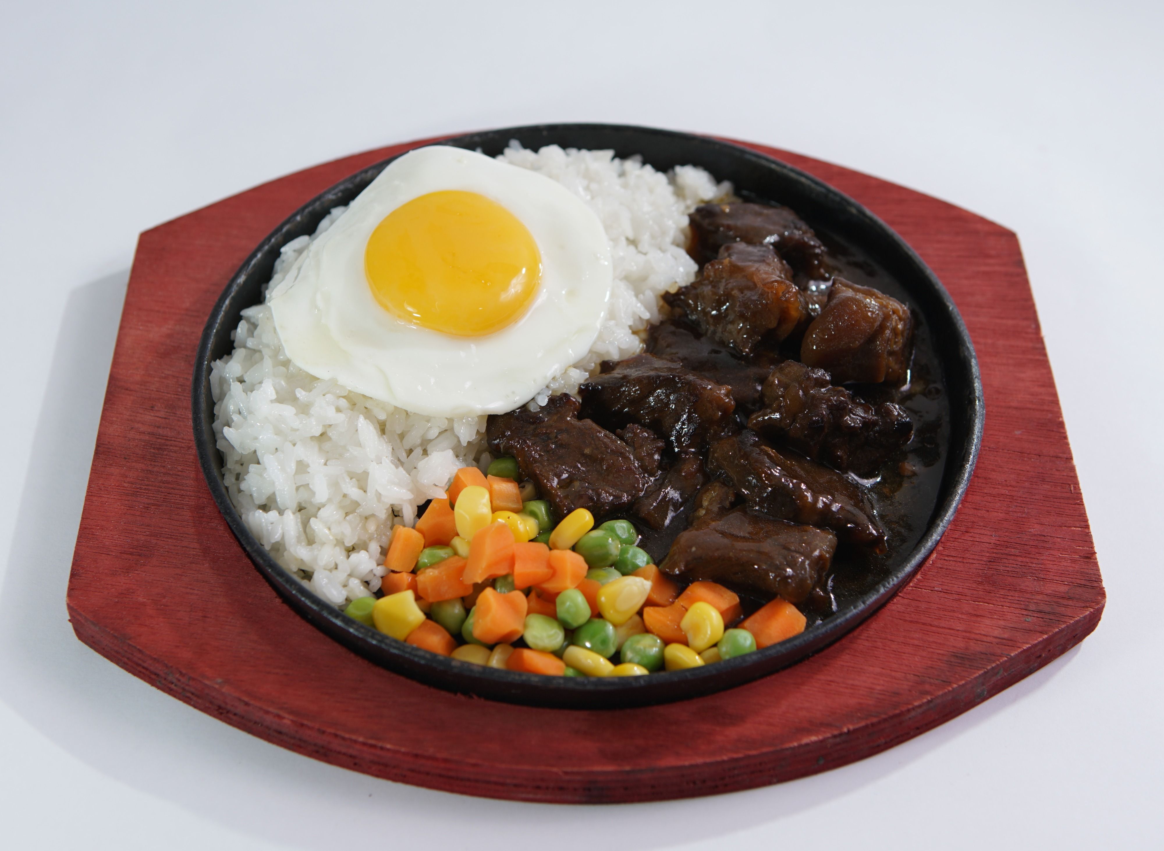 Sizzling Pares With Egg